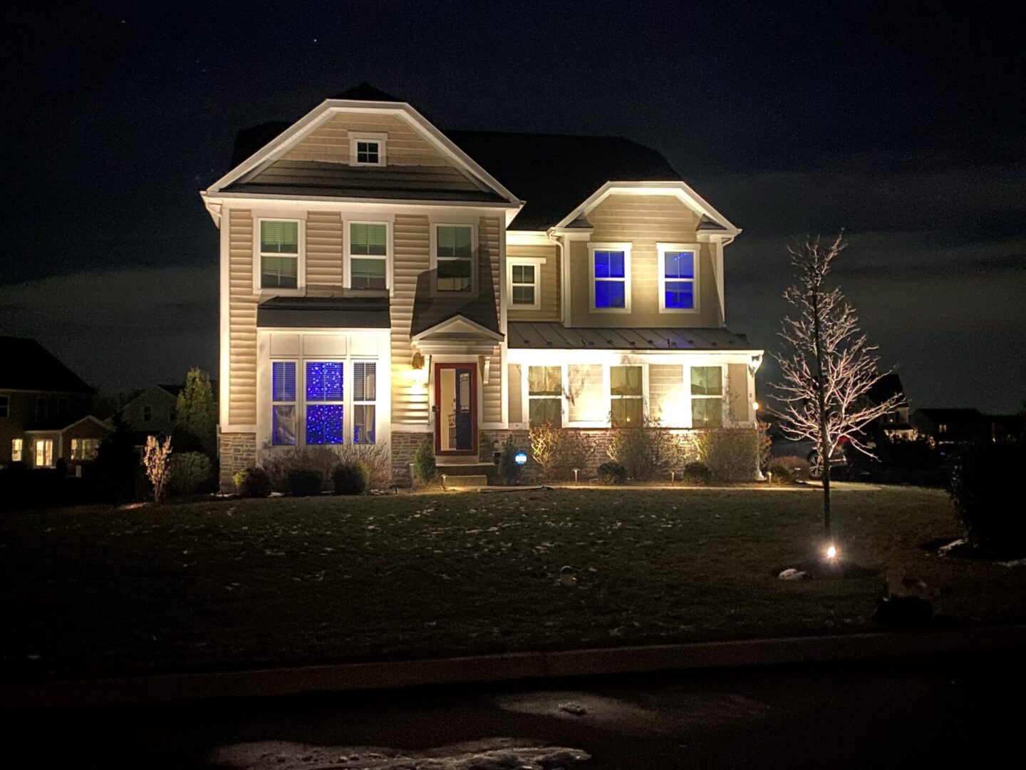 Illuminated Home with Landscape Lighting