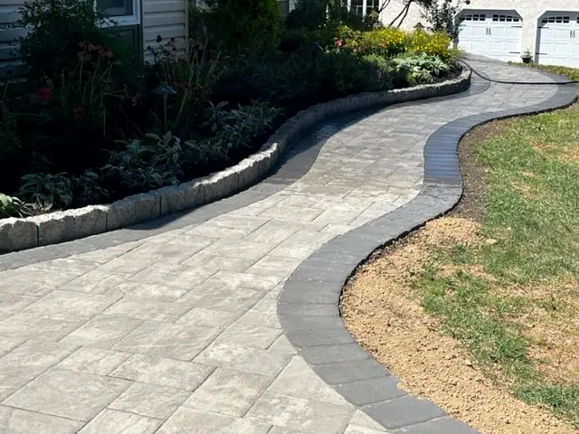 Curved ZIC ZAC shaped pathway with plants aside